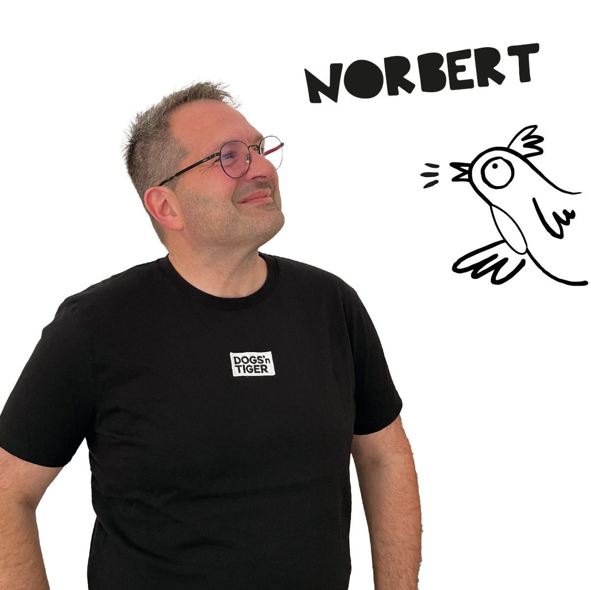 Foto von Norbert in schwarzem Shirt mit Dogs'n Tiger Logo
